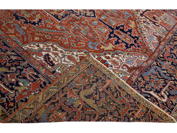 Antique Persian Heriz Handmade Rust Wool Rug with Medallion Design