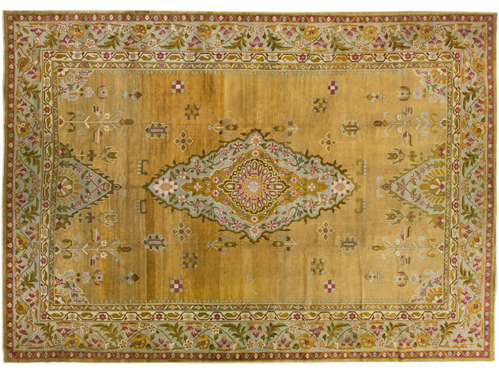 Antique Indian Agra Handmade Goldenrod Wool Rug With Medallion Design.