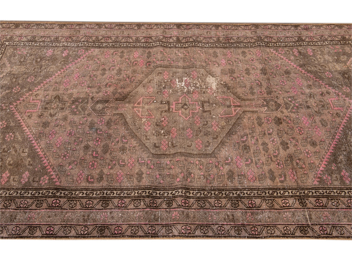 Vintage Persian Distressed Brown and Pink Handmade Wool Rug