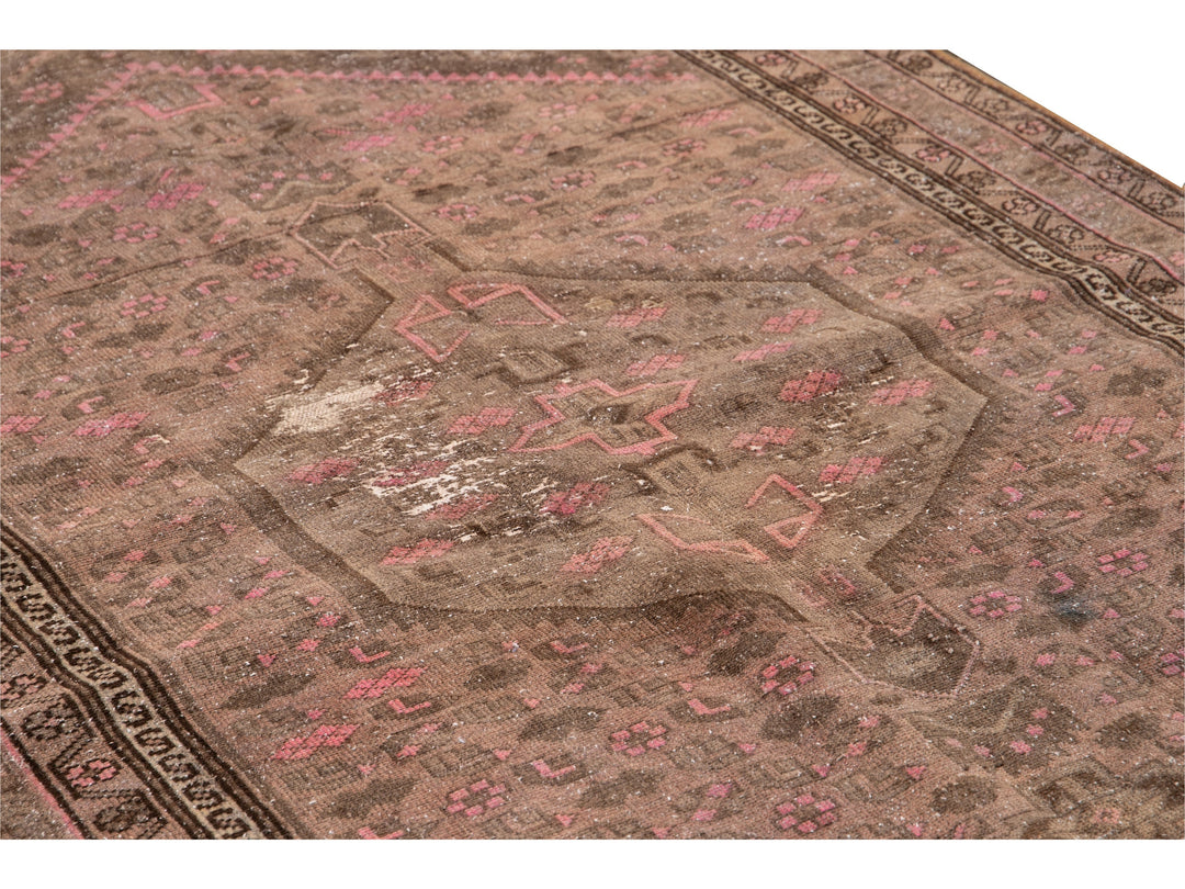 Vintage Persian Distressed Brown and Pink Handmade Wool Rug