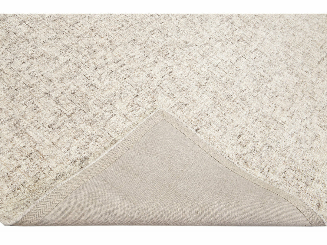 Modern Apadana's Westport Collection Hand Tufted Beige Wool Rug