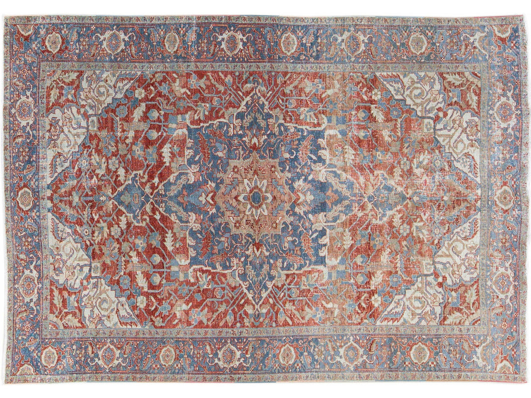 Antique Persian Heriz Handmade Red and Blue Medallion Floral Wool Rug