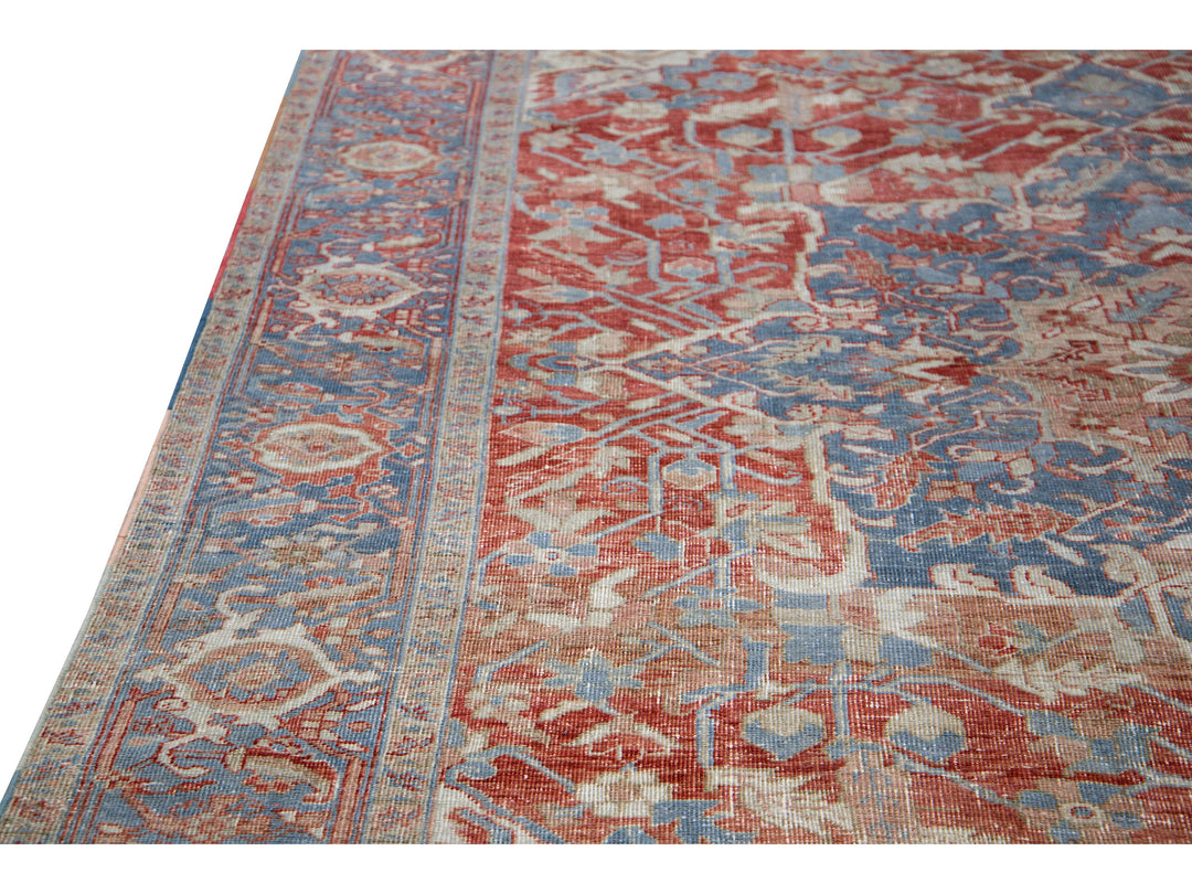 Antique Persian Heriz Handmade Red and Blue Medallion Floral Wool Rug
