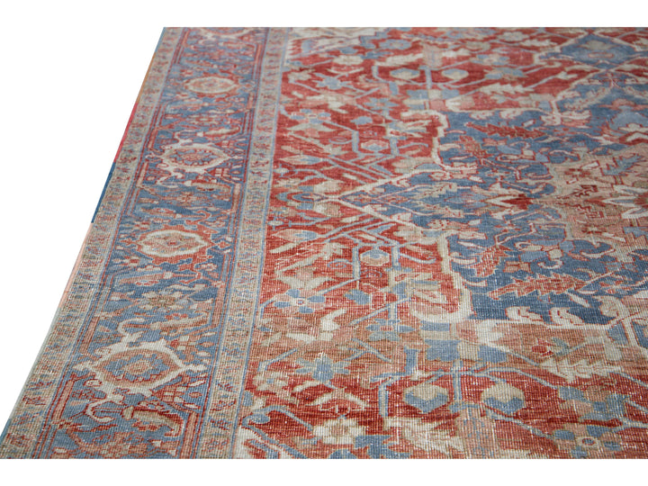 Antique Persian Heriz Handmade Red and Blue Medallion Floral Wool Rug