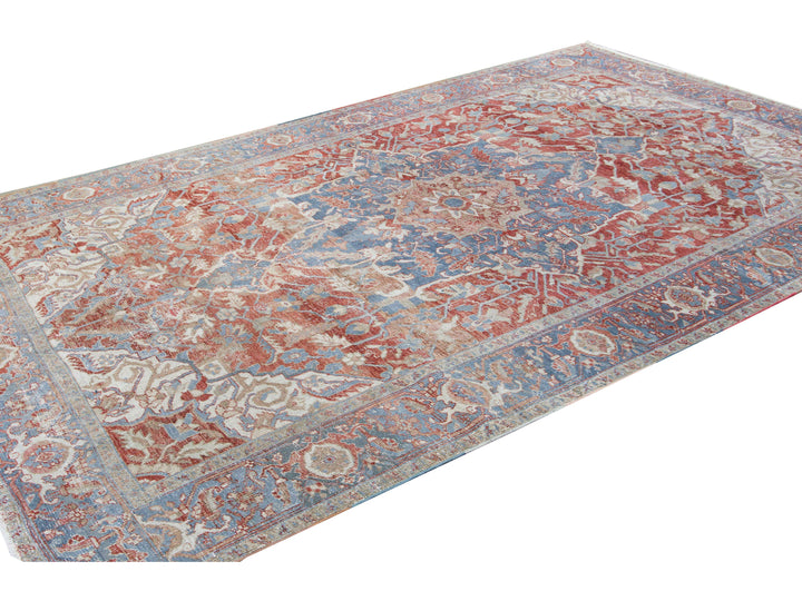 Antique Persian Heriz Handmade Red and Blue Medallion Floral Wool Rug
