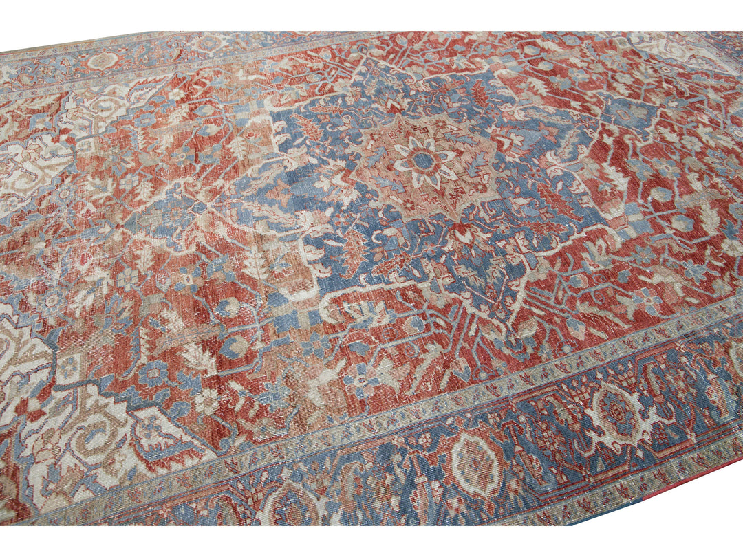 Antique Persian Heriz Handmade Red and Blue Medallion Floral Wool Rug