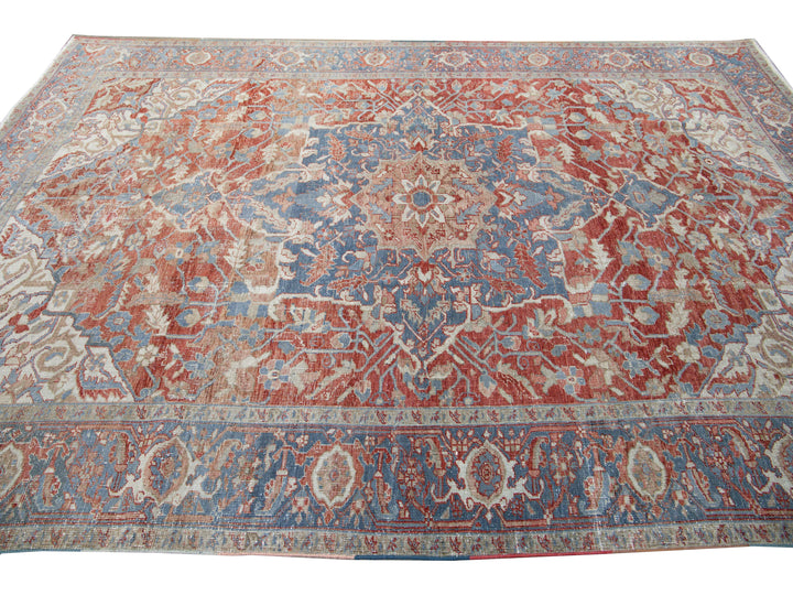 Antique Persian Heriz Handmade Red and Blue Medallion Floral Wool Rug