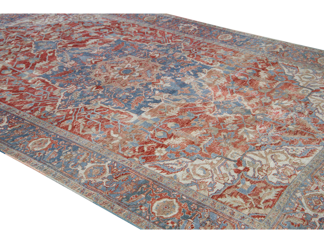 Antique Persian Heriz Handmade Red and Blue Medallion Floral Wool Rug