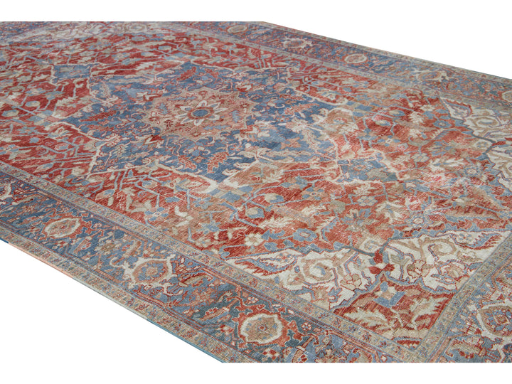 Antique Persian Heriz Handmade Red and Blue Medallion Floral Wool Rug