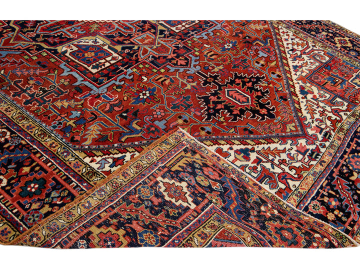 Antique Persian Heriz Handmade Orange-Rust Wool Rug with Medallion Design