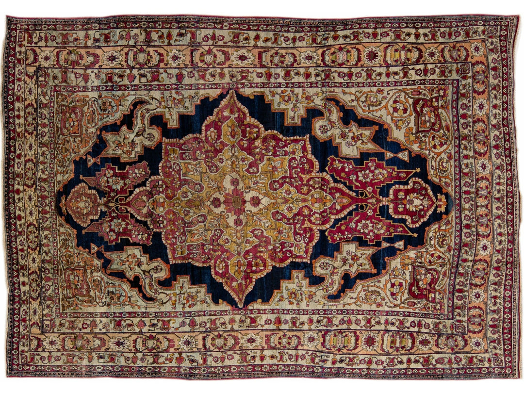 Antique Kerman Handmade Red and Blue Floral Medallion Motif Wool Rug