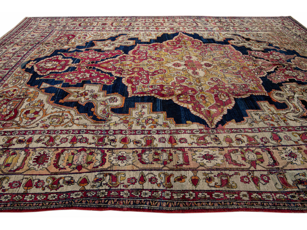 Antique Kerman Handmade Red and Blue Floral Medallion Motif Wool Rug