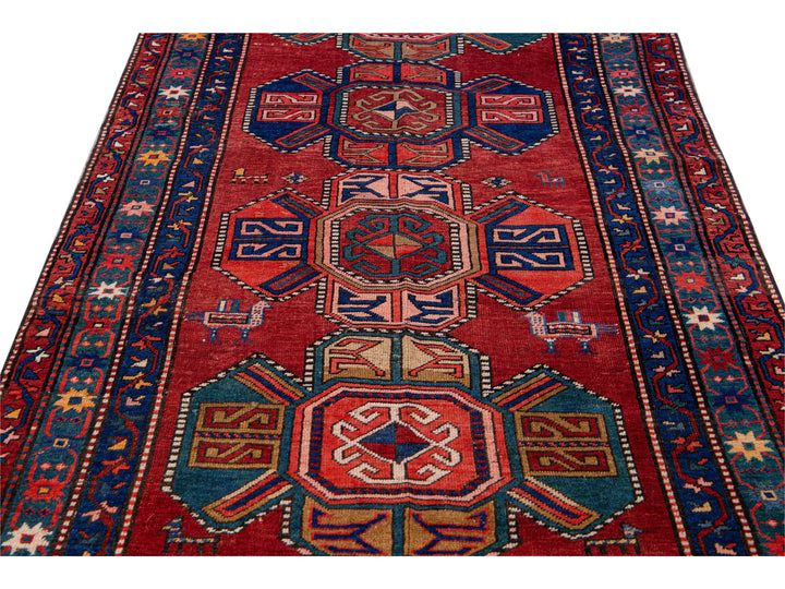 19th Century Kazak Multicolor Tribal Motif Red Wool Runner